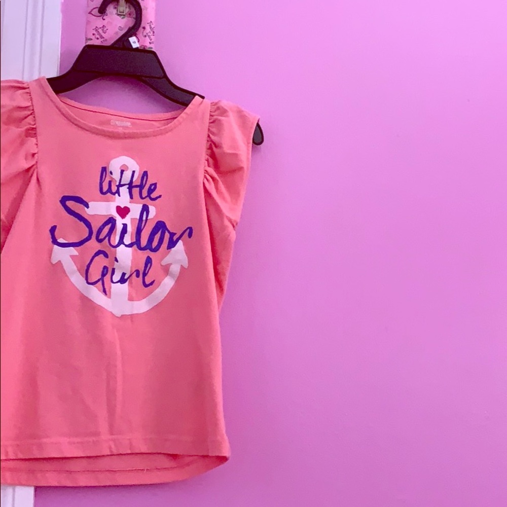 a cute pink shirt that is perfect for the summer